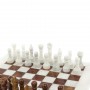 Каменные шахматы "Игрок" из белого мрамора и оникса 38х38 см 128888